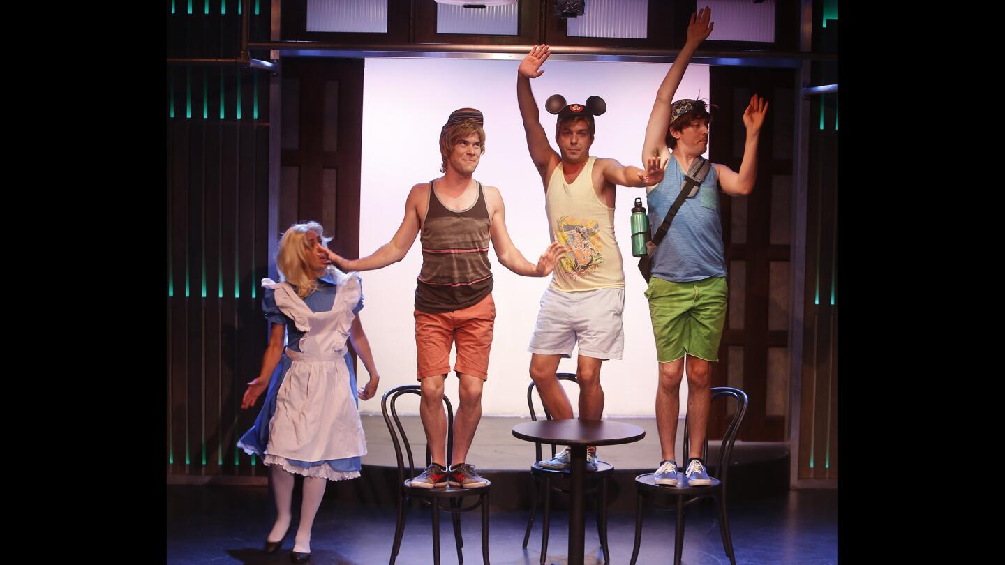 Lauren Burns, Greg Worwick, Chris Eckert and Matt Cook perform in a skit called "Mad Tea Party."