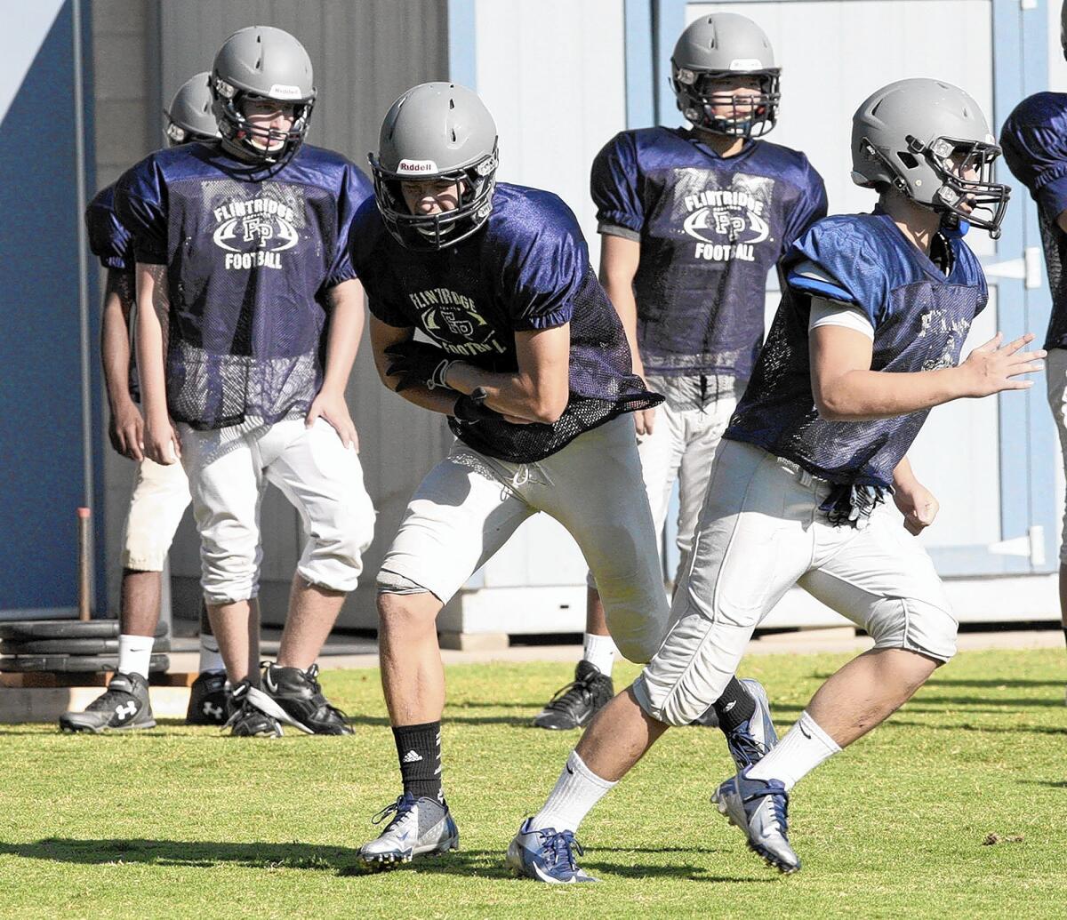 Flintridge Prep's Elliot Witter does drills during practice on Tuesday, August 26, 2014.