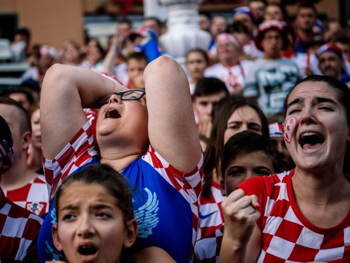 Croatian supporters react during the 2018 Russia World Cup final against France.