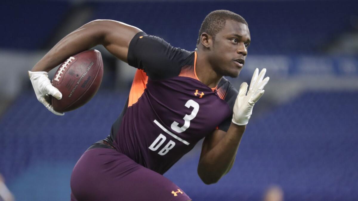 Deandre Baker runs a drill at the NFL scouting combine in Indianapolis on March 4, 2019.