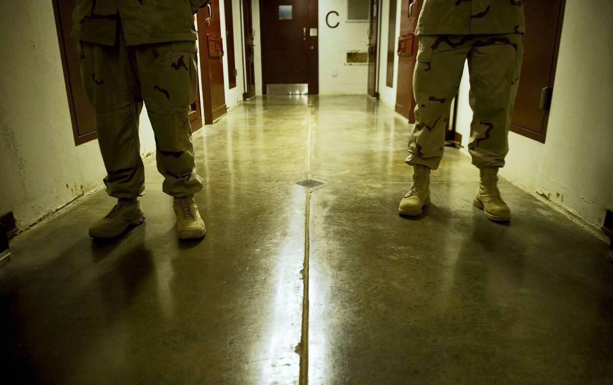 Navy personnel on duty at the U.S. military prison at Guantanamo Bay last year. More than half the prisoners are from Yemen.