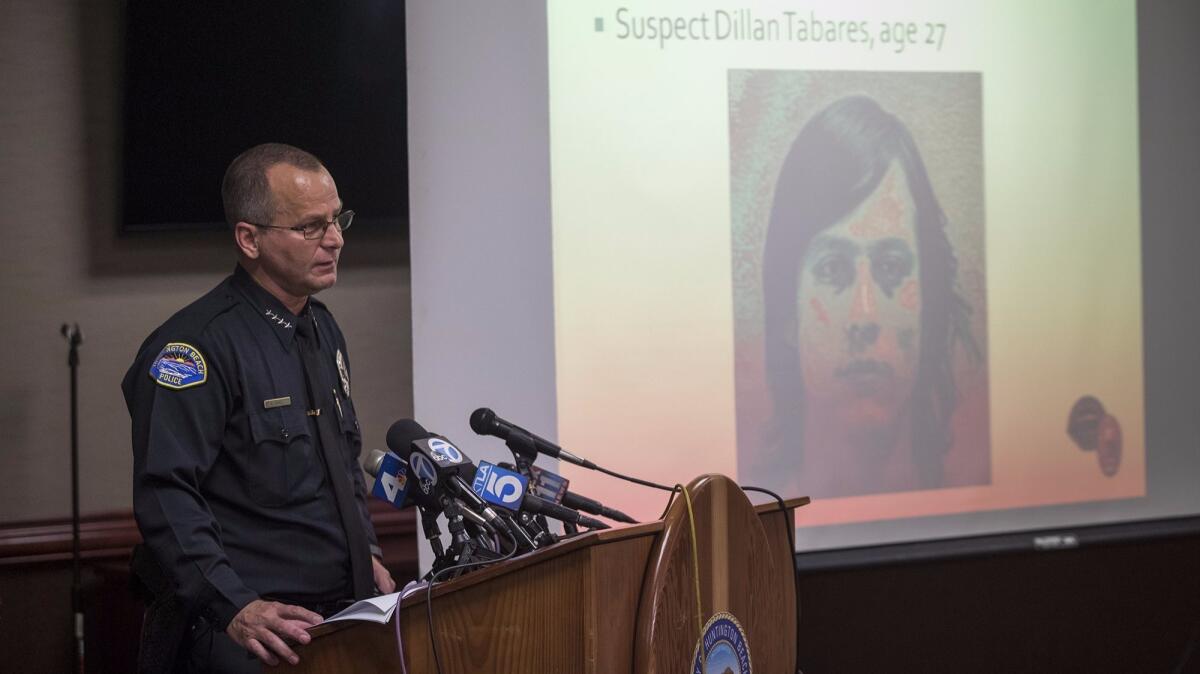 Huntington Beach Police Chief Robert Handy names Dillan Tabares as a suspect in a September homicide during a news conference Tuesday. Tabares was shot to death by a Huntington Beach police officer three days after the killing.