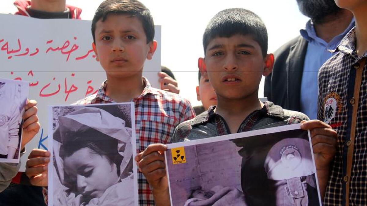 Residents of Khan Sheikhoun, Syria, protest a deadly chemical weapons attack on their town.