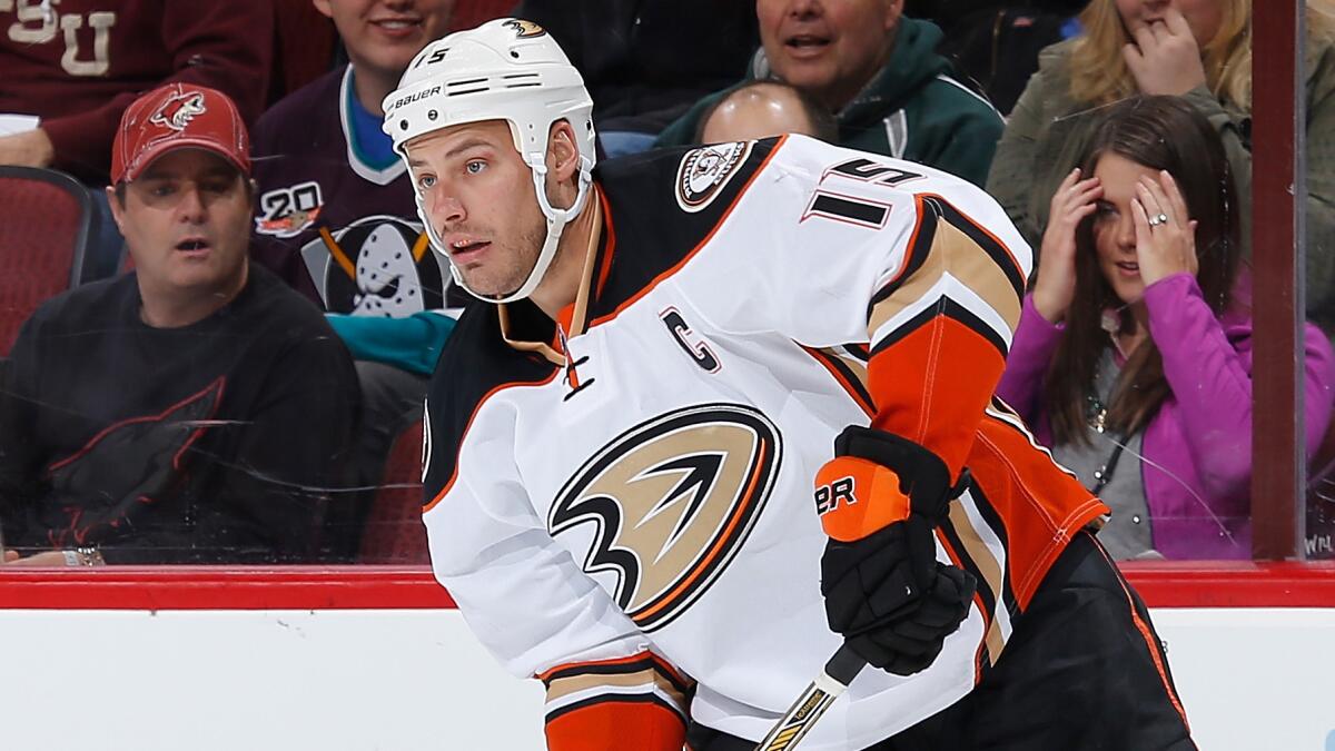 Ducks captain Ryan Getzlaf passes during a loss to the Phoenix Coyotes on Saturday.