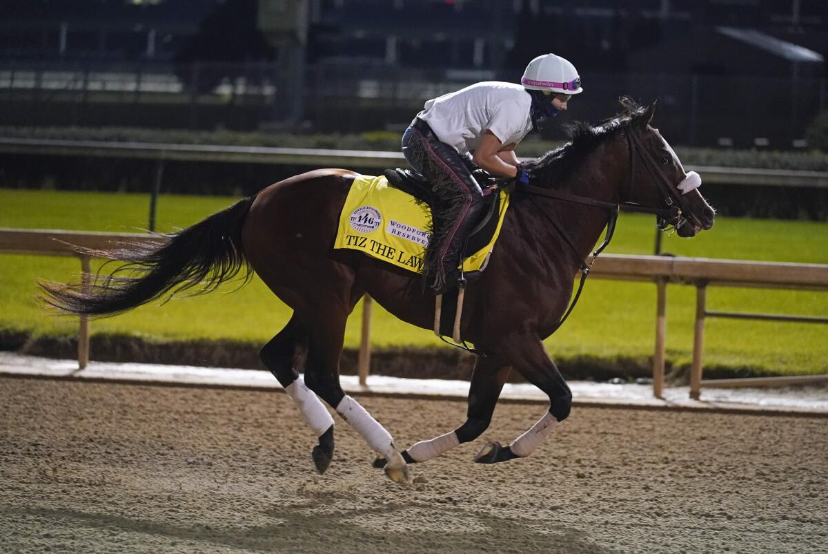 Kentucky Derby entry Tiz The Law runs during a workout at Churchill Downs on Friday.