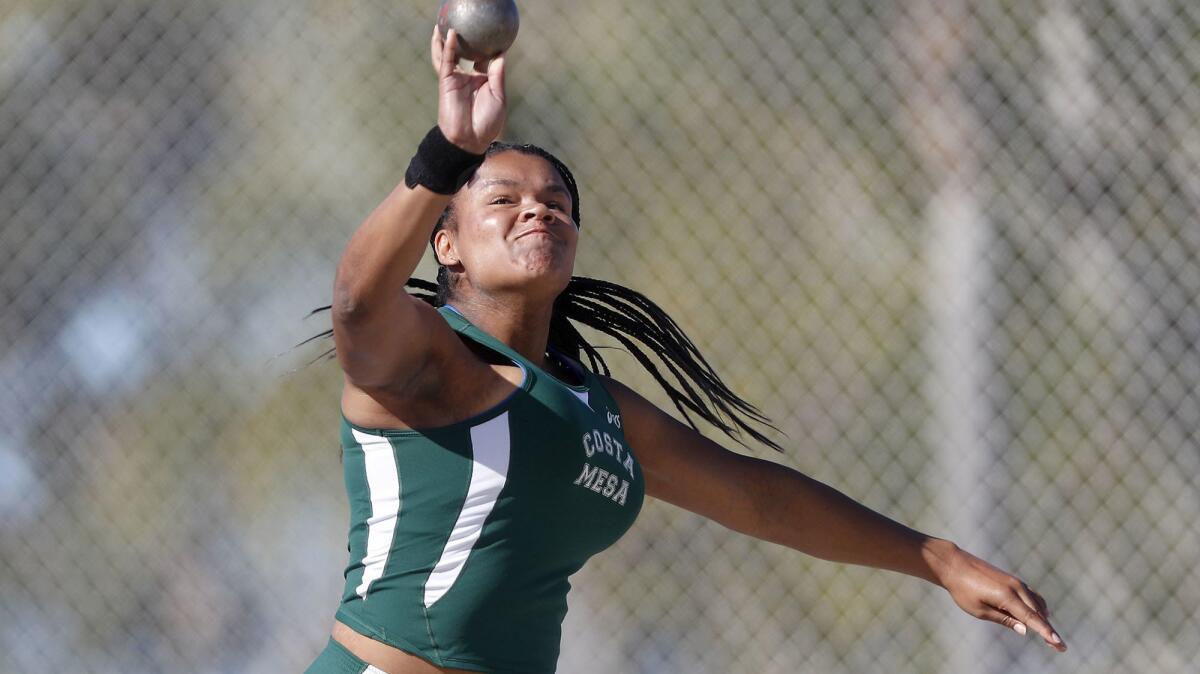 Costa Mesa High's Felicia Crenshaw competes in the girls' shot put at the Laguna Beach Trophy Invitational on Saturday, March 17.