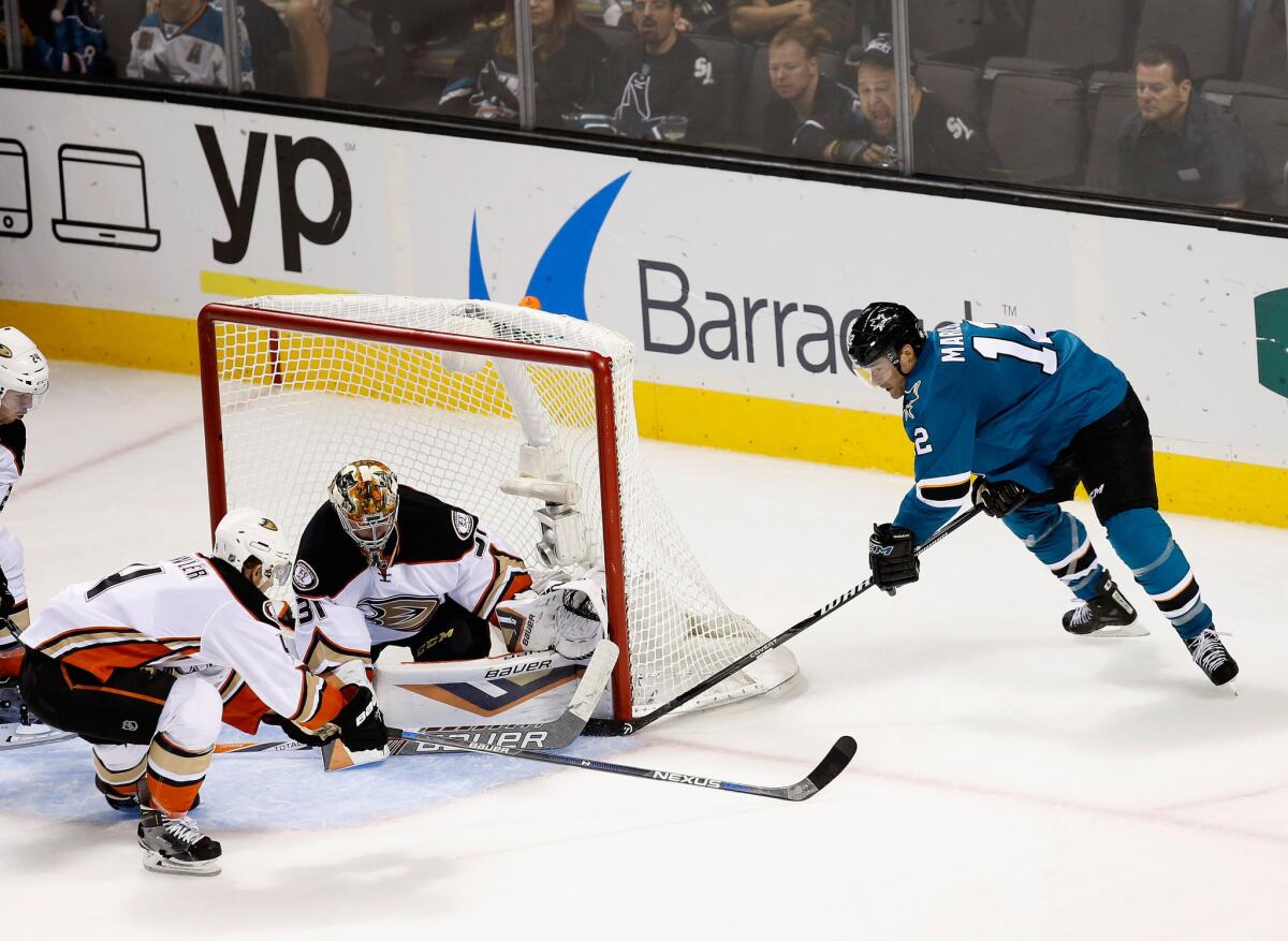 Patrick Marleau of the San Jose Sharks scores a goal on the Ducks' Frederik Andersen in the third period of a game Saturday at the SAP Center.