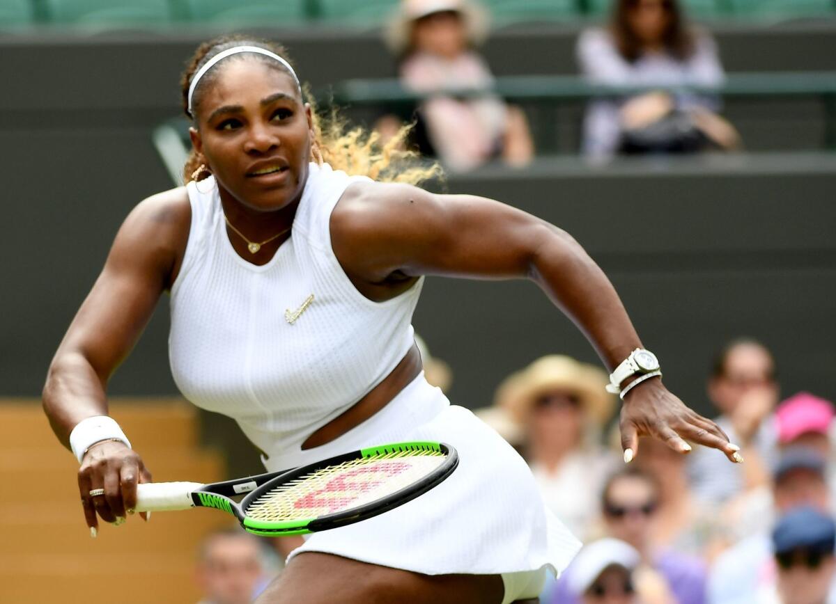 Serena Williams defeated Carla Suarez Navarro in straight sets Monday at Wimbledon.