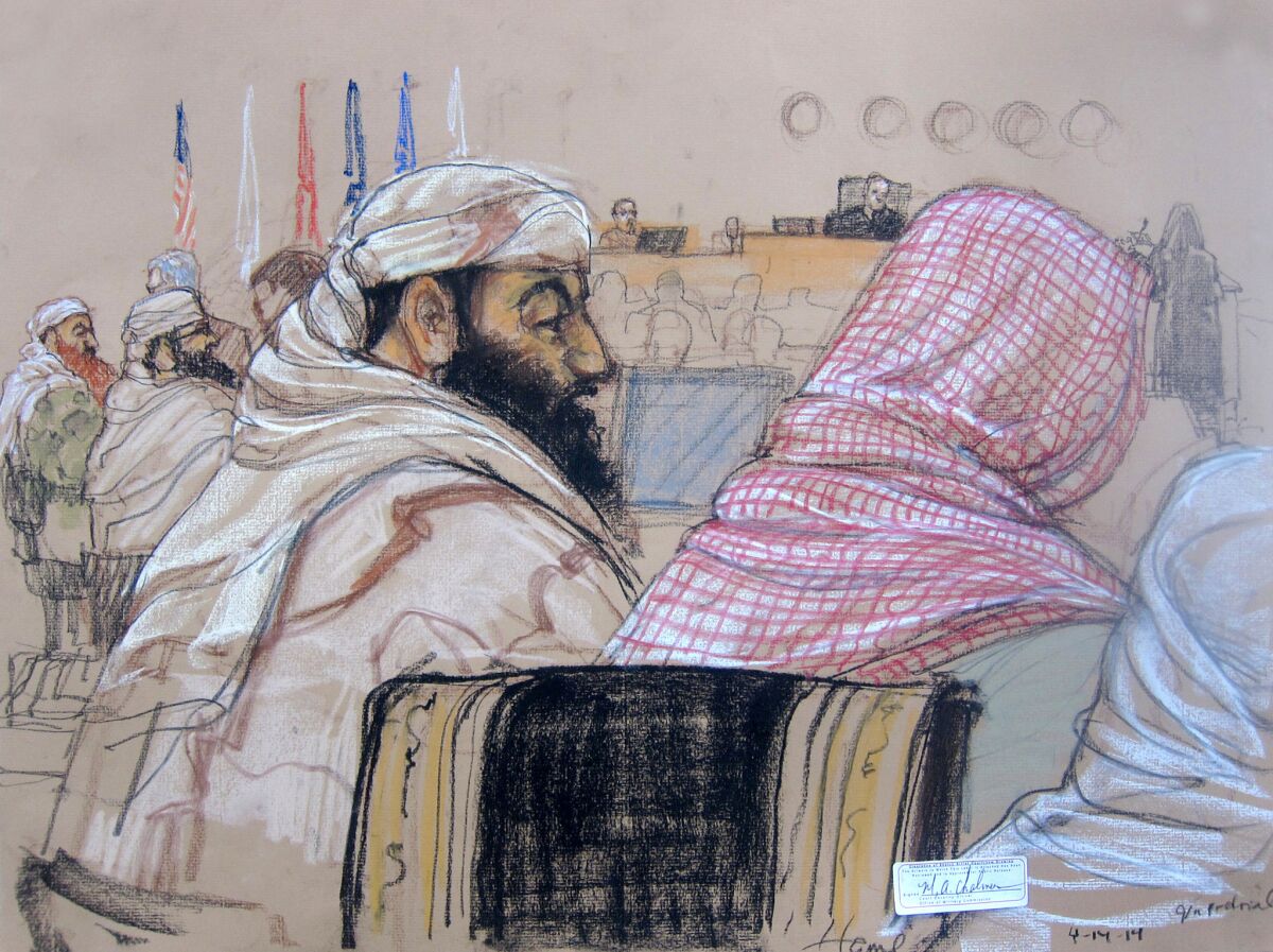 Defendant Ramzi Binalshibh, center, attends a pretrial hearing with other defendants in Guantanamo Bay, Cuba.