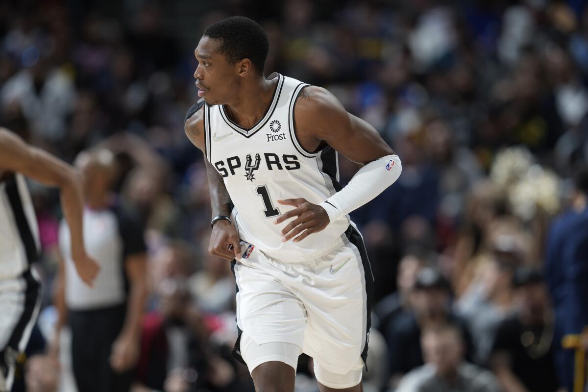 Spurs guard Lonnie Walker IV runs back on defense.