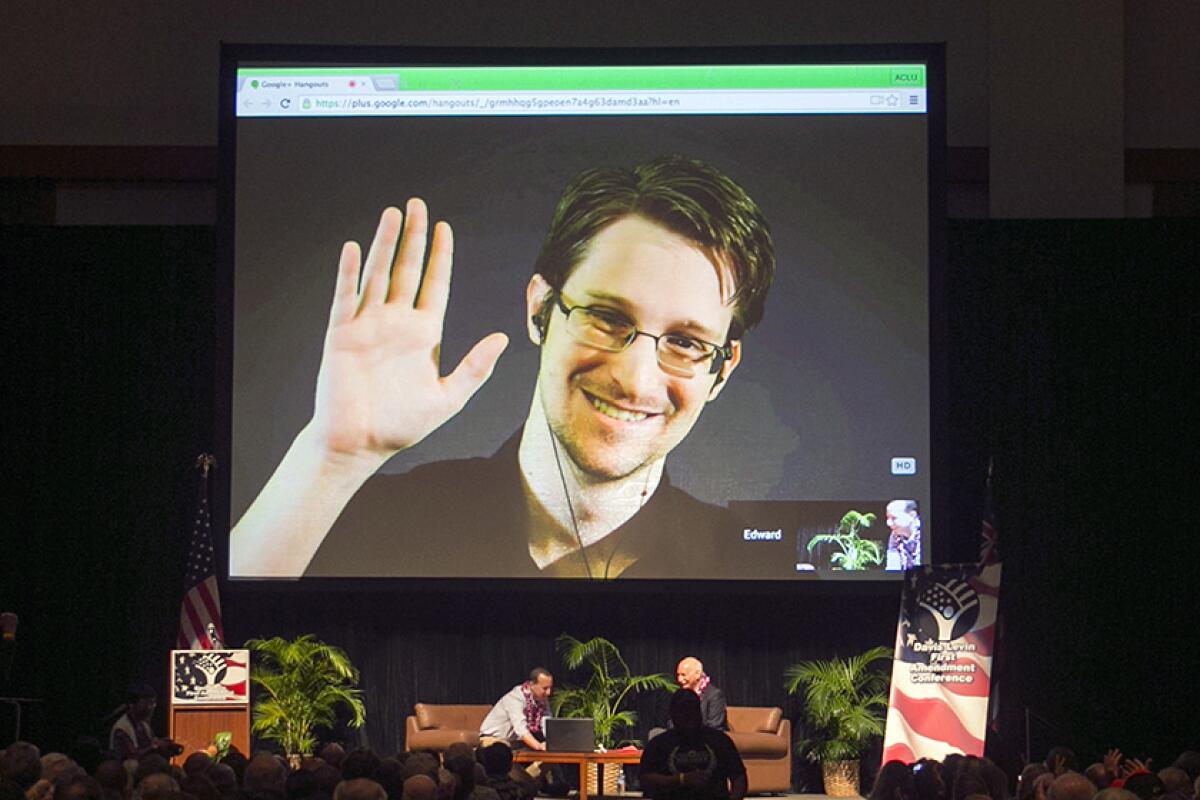 Edward Snowden appears on a live video feed during an event sponsored by ACLU Hawaii in Honolulu in 2015.