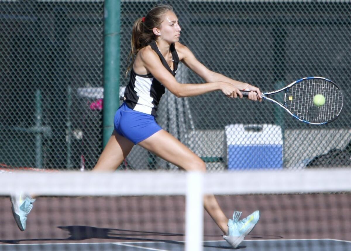 Nicole Merrit and the Burbank High girls' tennis singles contingent led the way to a win over Crescenta Valley on Thursday.