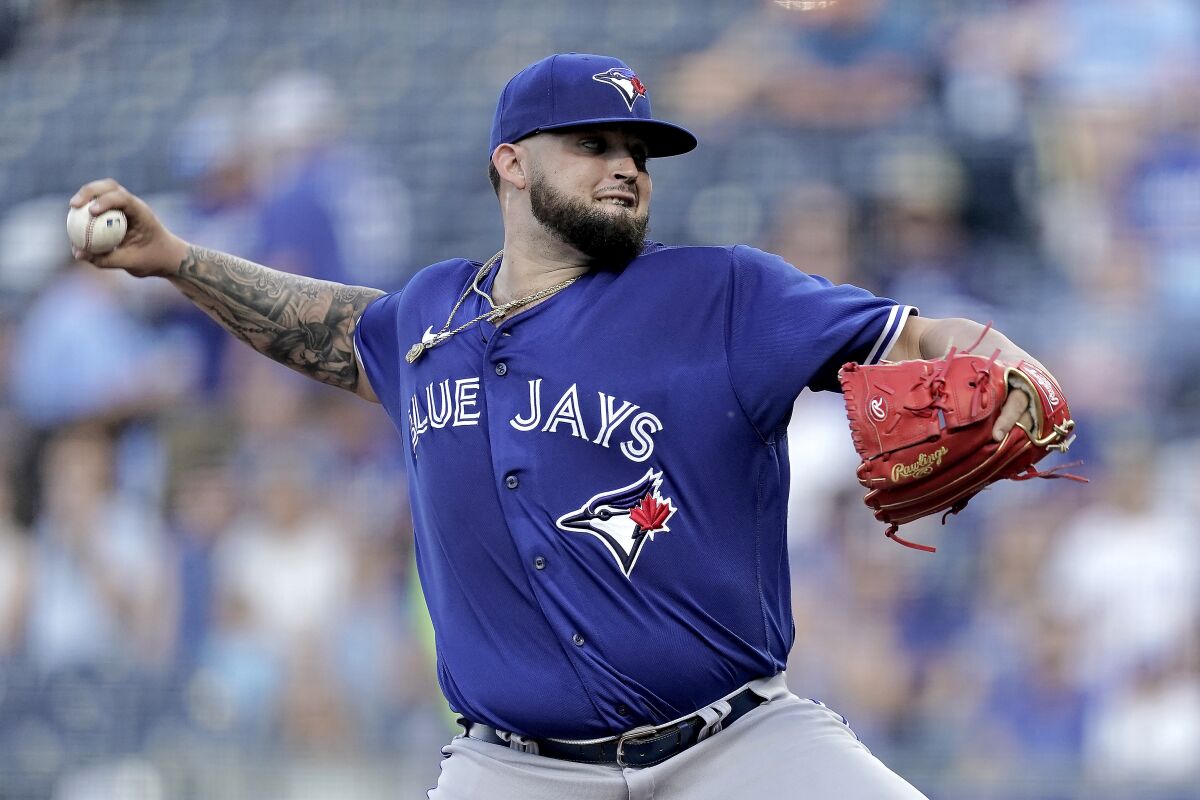 Toronto Blue Jays starting pitcher Alek Manoah throws during the second inning of a baseball game against the Kansas City Royals Tuesday, June 7, 2022, in Kansas City, Mo. (AP Photo/Charlie Riedel)