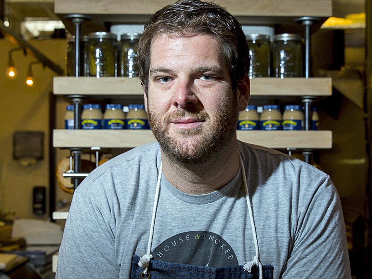 LOS ANGELES, CA -- JULY 25, 2014--Micah Wexler, chef and co-owner of Wexler's Deli, inside Grand Central Market, in downtown L.A., July 25, 2014. (Jay L. Clendenin / Los Angeles Times)