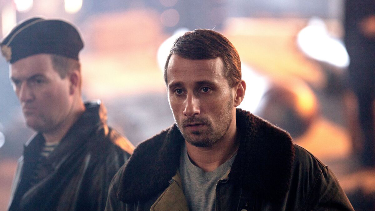 Cavron Jérémy, left, and and Matthias Schoenaerts in the movie "The Command."