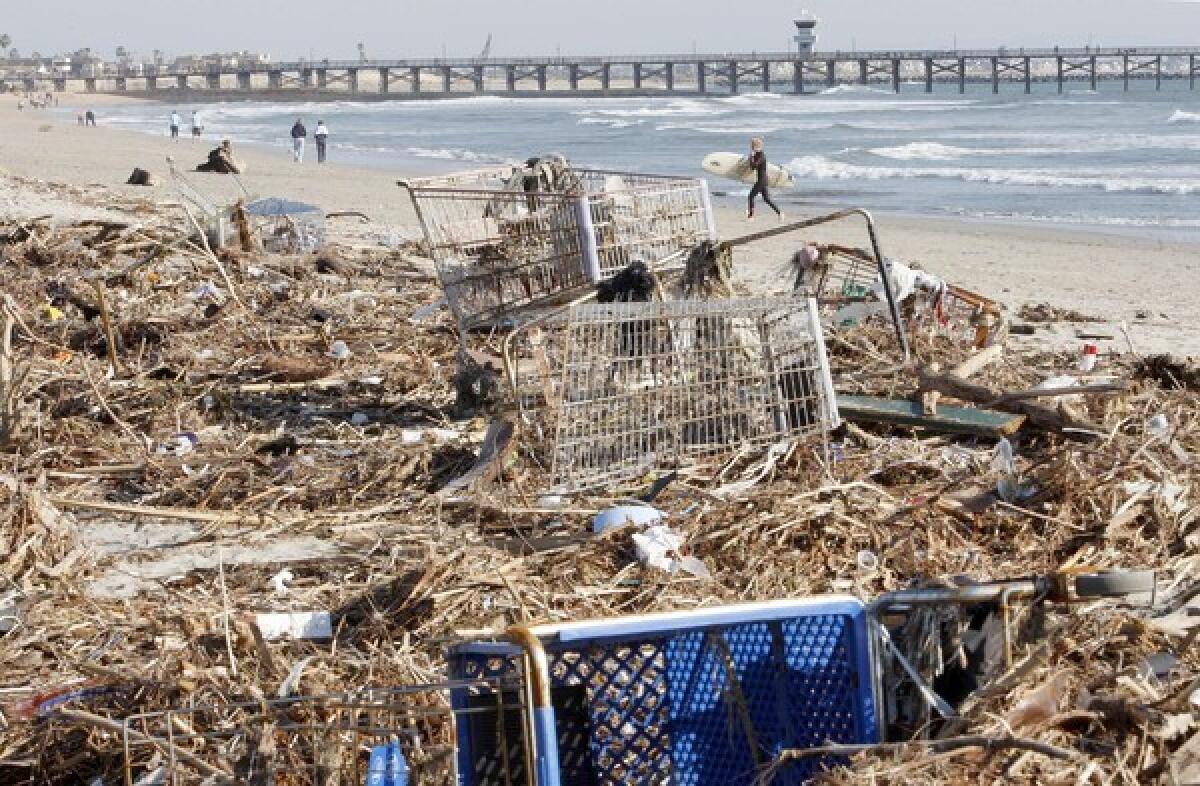 Heavy storms leave Southern California's shoreline littered with trash. The rainwater picks up trash from streets and dumps it onto beaches.