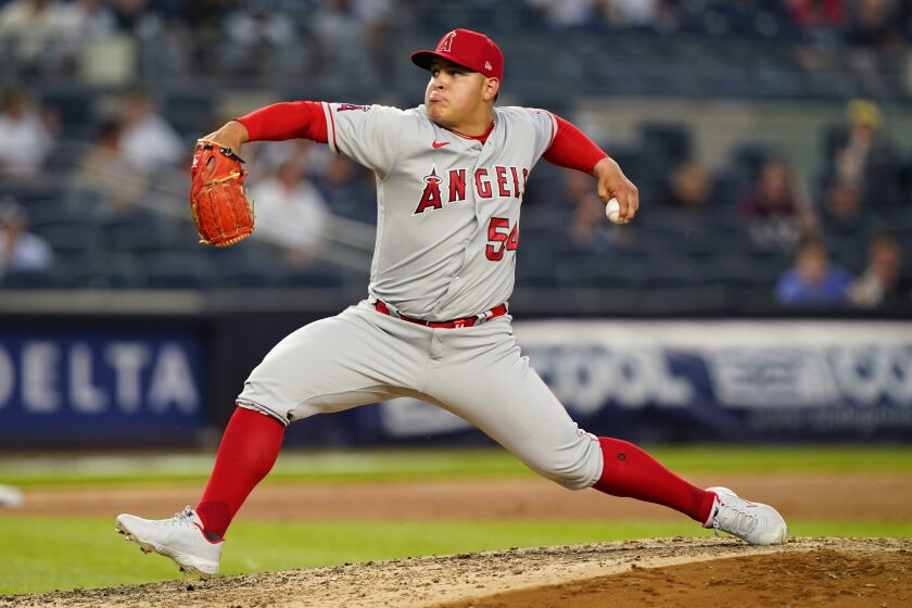 Los Angeles Angels starting pitcher Jose Suarez winds up during the third inning of a baseball game against the New York Yankees, Monday, June 28, 2021, at Yankee Stadium in New York. (AP Photo/Kathy Willens)