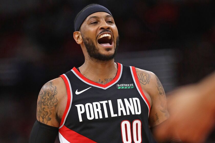 CHICAGO, ILLINOIS - NOVEMBER 25: Carmelo Anthony #00 of the Portland Trail Blazers yells after a dunk against the Chicago Bulls at the United Center on November 25, 2019 in Chicago, Illinois. The Trailblazers defeated the Bulls 117-94. NOTE TO USER: User expressly acknowledges and agrees that, by downloading and or using this photograph, User is consenting to the terms and conditions of the Getty Images License Agreement. (Photo by Jonathan Daniel/Getty Images)