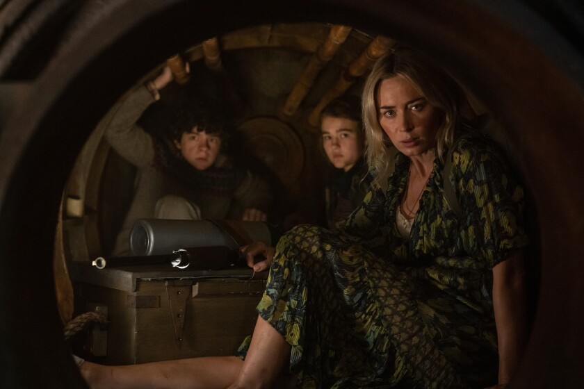 Noah Jupe, from left, Millicent Simmonds and Emily Blunt in 