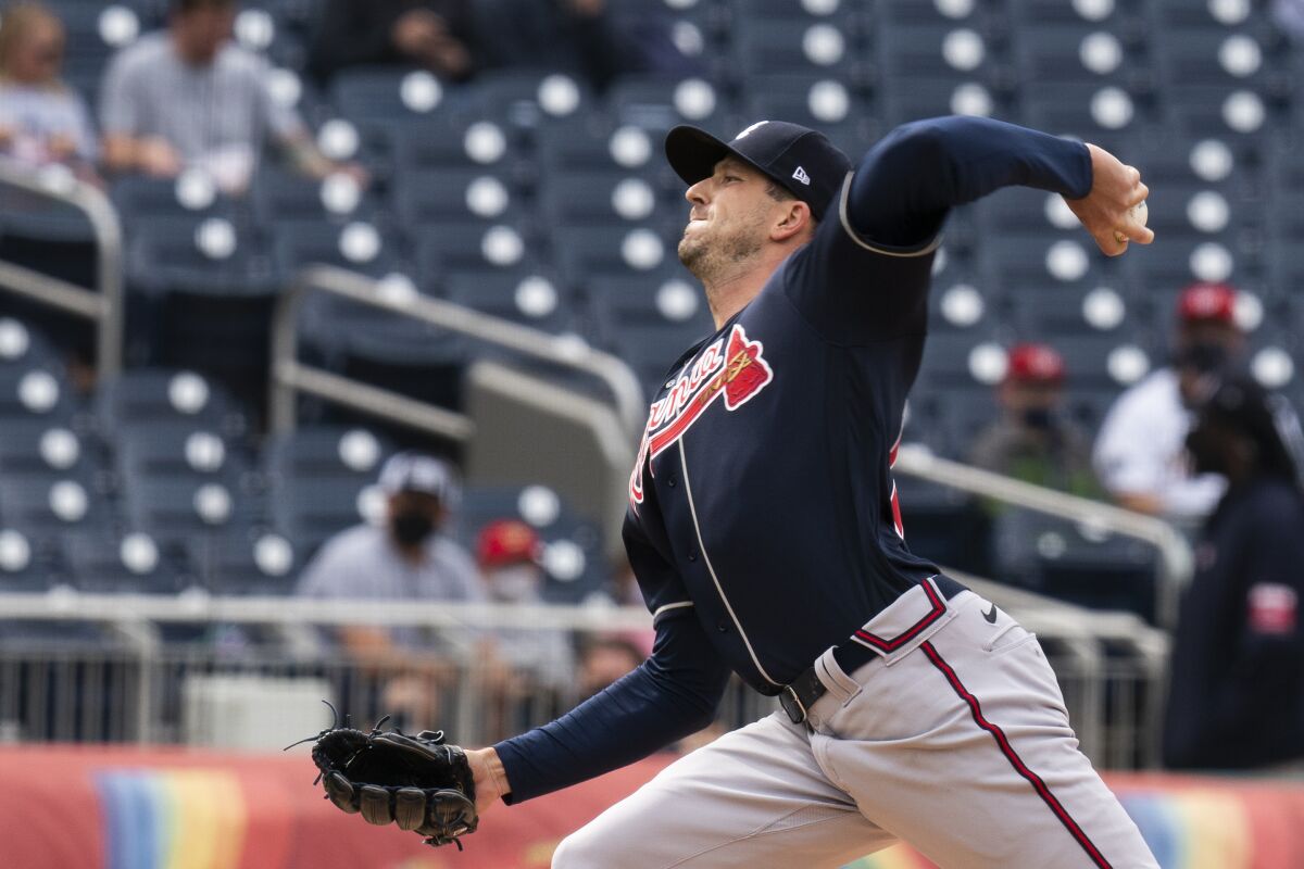 Atlanta Braves' starting pitcher Drew Smyly throws during the first inning of a baseball game against the Washington Nationals in Washington, Thursday, May 6, 2021. (AP Photo/Manuel Balce Ceneta)