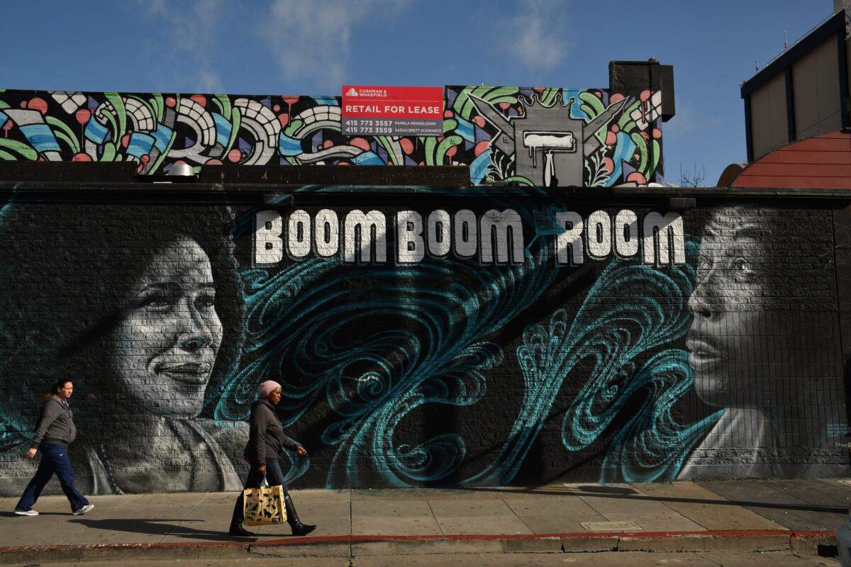 The Boom Boom Room, a lounge and music venue that keeps a booth reserved for the late John Lee Hooker, stands across from the Fillmore at the corner of Geary Boulevard and Fillmore Street.