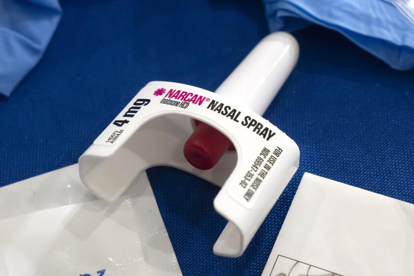 FILE - A container of Narcan, a brand name version of the opioid overdose-reversal drug naloxone, sits on a table following a demonstration at the Health and Human Services Humphrey Building on Friday, Sept. 8, 2023, in Washington. The number of U.S. fatal overdoses fell in 2023 — for only the second time since the current national epidemic of drug deaths began more than three decades ago. The Centers for Disease Control and Prevention posted the numbers on Wednesday, May 15, 2024. (AP Photo/Mark Schiefelbein, File)