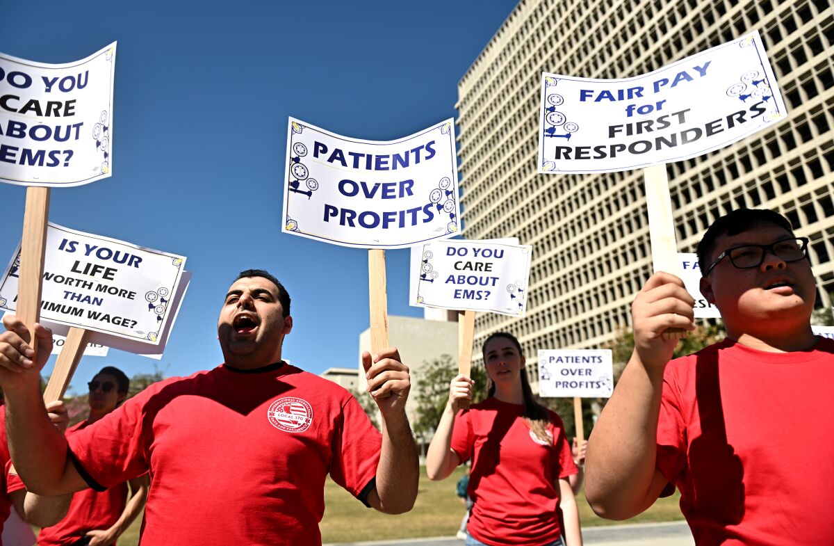 Emergency medical technicians protest outside L.A. City Hall