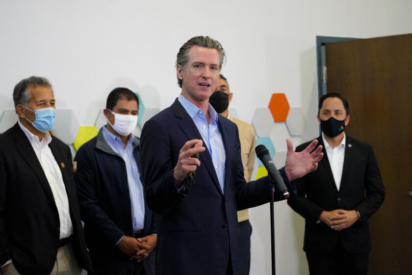 San Diego, CA - April 02: At Park de la Cruz Recreation Center on Friday, April 2, 2021 in San Diego, CA., Governor Gavin Newsom spoke with news reporters about San Diego’s newest pop-up vaccination site at the Park de la Cruz Recreation Center in the City Heights neighborhood. Accompanying Newsom was Juan Vargas, Ben Hueso, Sean Elo-Rivera and Todd Gloria. (Nelvin C. Cepeda / The San Diego Union-Tribune)
