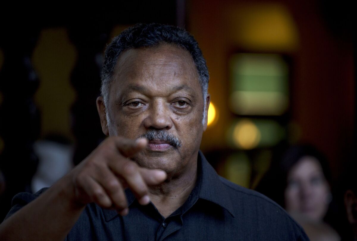 The Rev. Jesse Jackson points to a reporter as he takes questions during an impromptu news conference at the Hotel Nacional in Havana. Jackson last month accepted a request by the Revolutionary Armed Forces of Colombia, or FARC, to oversee the release of a U.S. citizen, Kevin Scott Sutay, who was kidnapped in June.