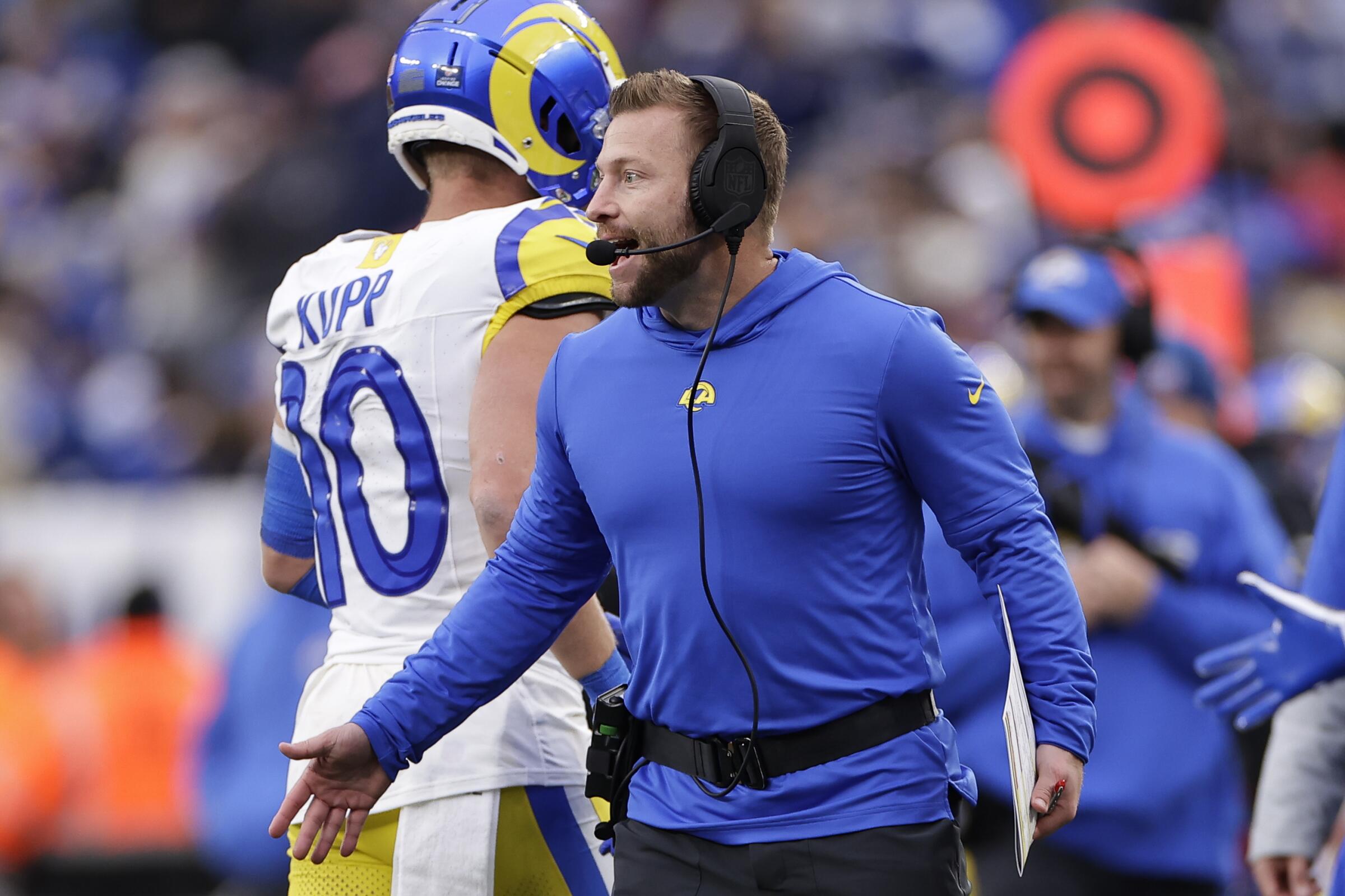Coach Sean McVay talks on his headset during the Rams game against the Giants.