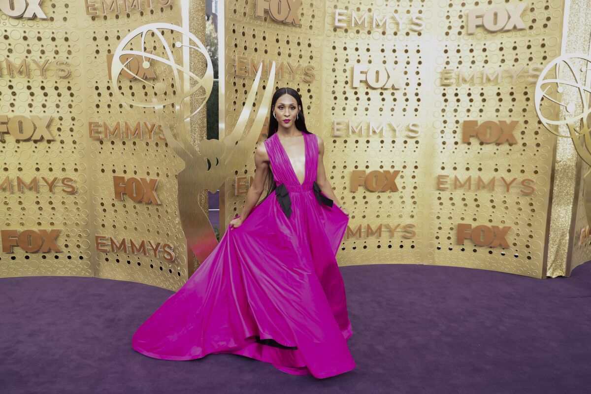 Mj Rodriguez on the purple carpet arriving at the 2019 Emmys.