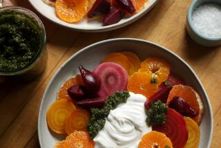 LOS ANGELES-CA-JUNE 6, 2023: Roasted beets, citrus, labneh and zhoug by Jeanne Kelley, author of Vegetarian Salad for Dinner, is photographed at her home in Eagle Rock on June 6, 2023. (Christina House / Los Angeles Times)