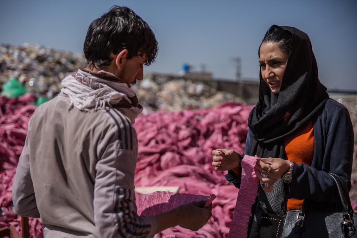 Zuhal Atmar's paper recycling plant processes up to 30 metric tons of waste each week, turning it into toilet paper that is sold across Afghanistan.
