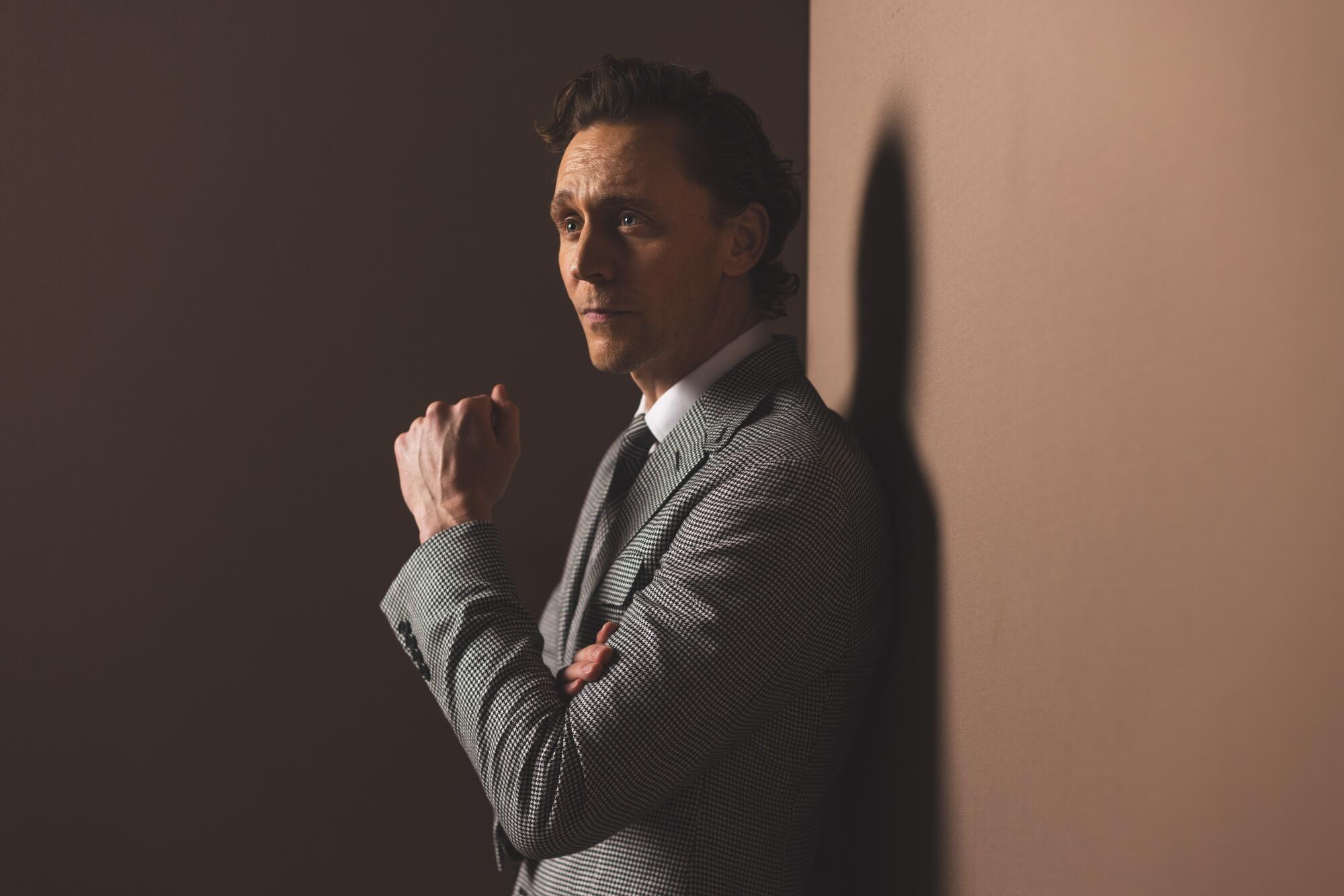 A portrait of Tom Hiddleston.