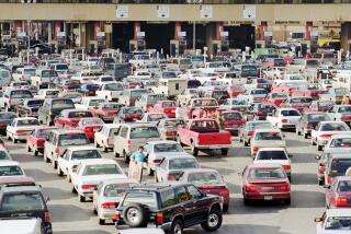 Afternoon traffic entering the U.S from Tijuana, Mexico backs up at the San Ysidro border crossing Friday Feb. 28, 1997. The border crossing is the world's busiest with over 50 million people crossing each year. U.S. officials estimate that over 70 percent of all drugs enter the U.S. from Mexico with a large pecentage of that occuring on the border between Tijuana and San Diego. (AP Photo/Denis Poroy)