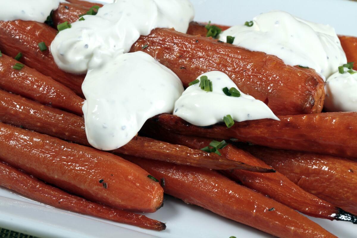 Connie and Ted's roasted carrots with rosemary butter and black pepper crème fraîche. Read the recipe »