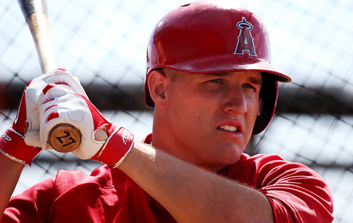 Angels center fielder takes part in batting practice during a spring-training practice session on Feb. 26. Trout says his contract situation will not persuade him to take a tentative approach to how he plays.