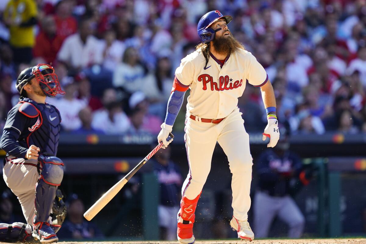The Philadelphia Phillies' Brandon Marsh connects for a three-run homer during Game 4 of the NLDS on Oct. 15, 2022. 