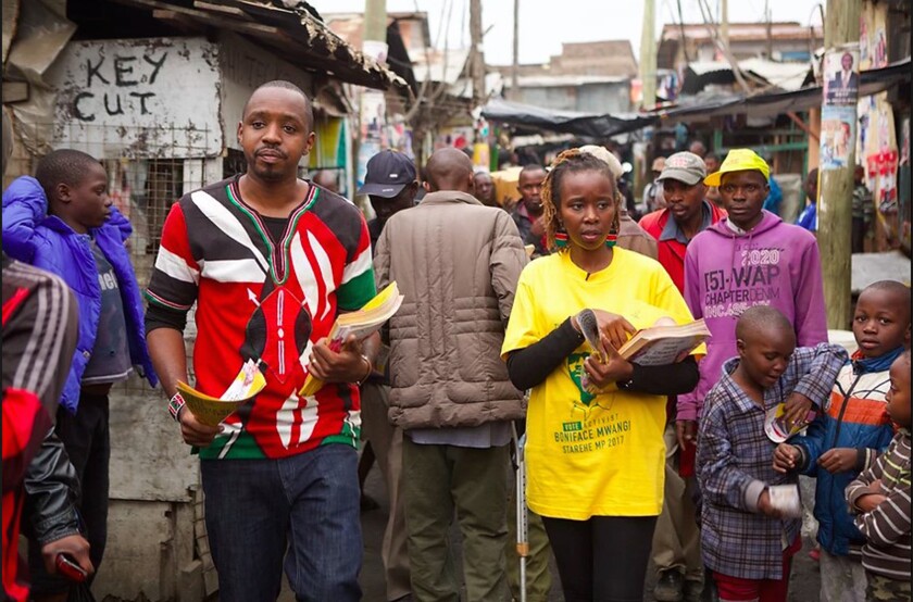 Candidate Boniface Mwangi and his wife Njeri Mwangi campaign in Nairobi, Kenya, in a scene from the documentary "Softie."