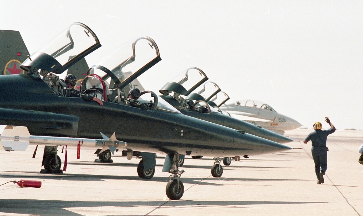 Planes line up for a day of filming at the Navy Fighter Weapons School, better known as Top Gun at Miramar Naval Air Station in San Diego, California, on Aug. 14, 1985. (Photo by Charles Starr/San Diego Union-Tribune) User Upload Caption: U-T file photos of pilots and planes at Miramar Naval Air Station during the filming of Paramount Pictures "Top Gun" movie in the summer of 1985.