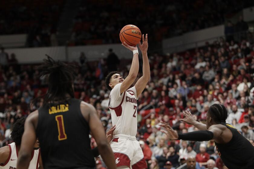 Washington State guard Myles Rice (2) shoots against Southern California during the second half of an NCAA college basketball game Thursday, Feb. 29, 2024, in Pullman, Wash. (AP Photo/Young Kwak)