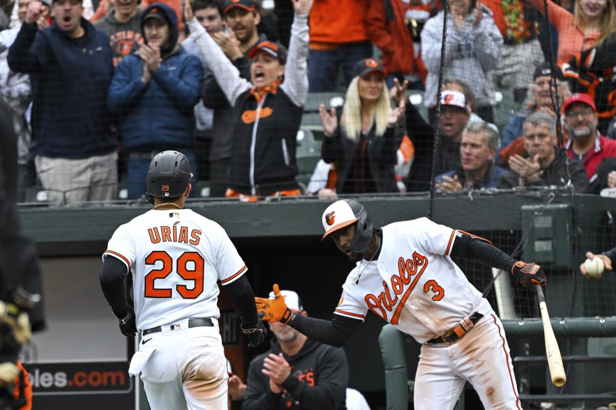 With bat and glove, Urías leads Orioles over Yankees 7-6 - NBC Sports