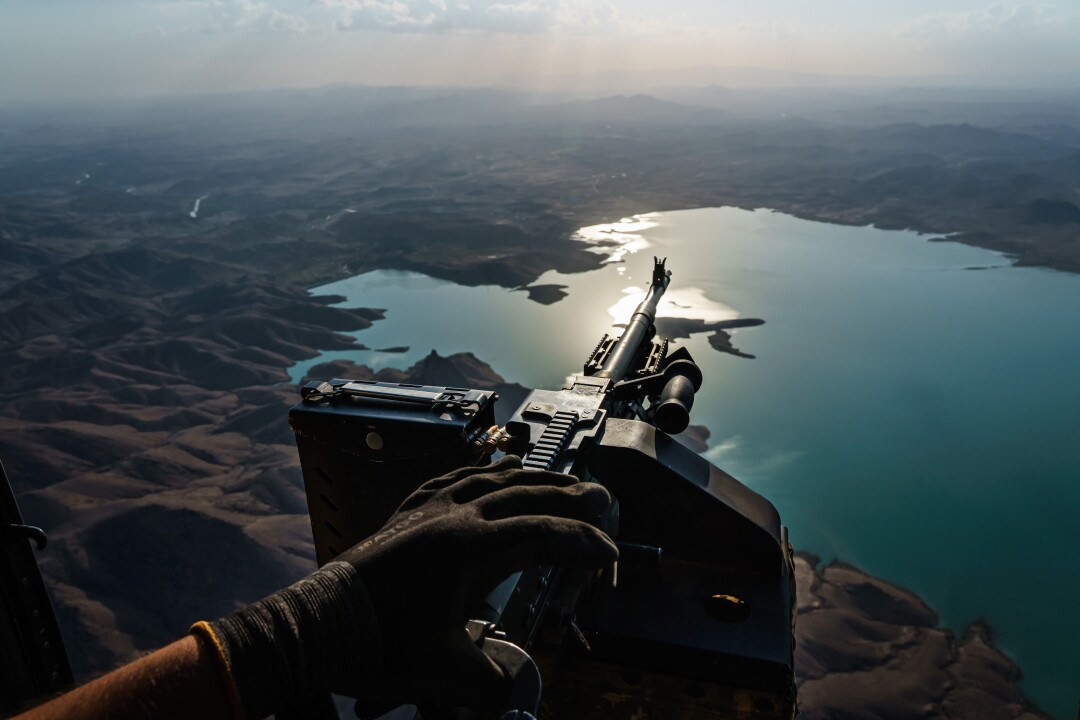 A UH-60 Blackhawk, passes Arghandab Dam after a mission north of Kandahar, Afghanistan