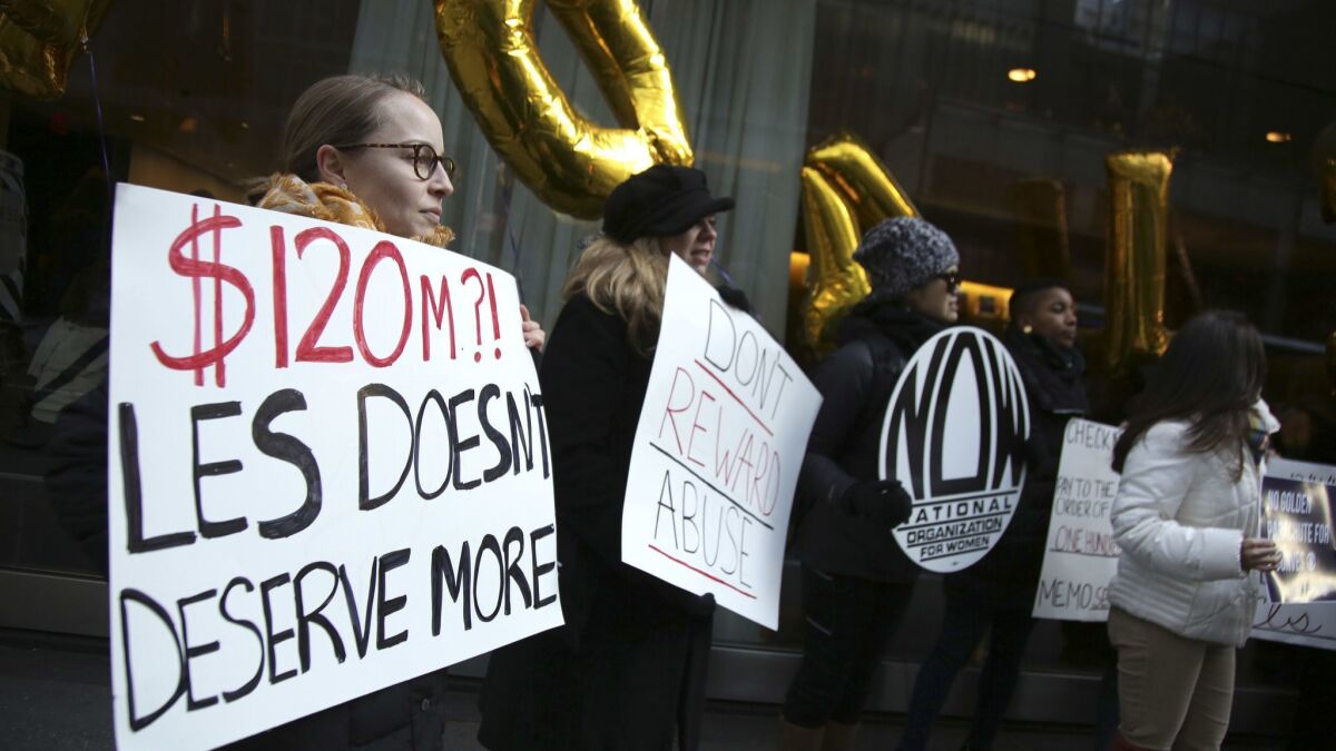 Protesters outside the CBS shareholders' meeting in New York on Tuesday demand that $120 million in severance be withheld from former CEO Les Moonves.