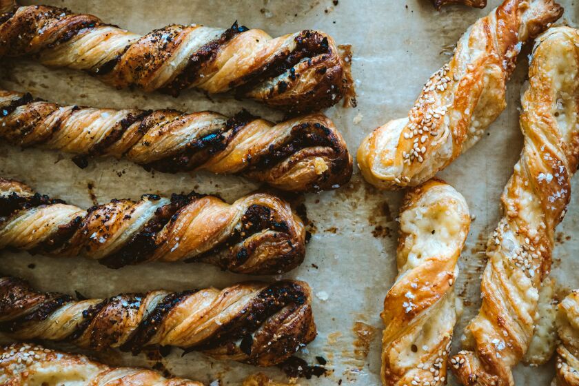 Comte Sesame Twists from the cookbook: "A Table: Recipes for Cooking + Eating The French Way" By Rebekah Peppler, Photos by Joann Pai