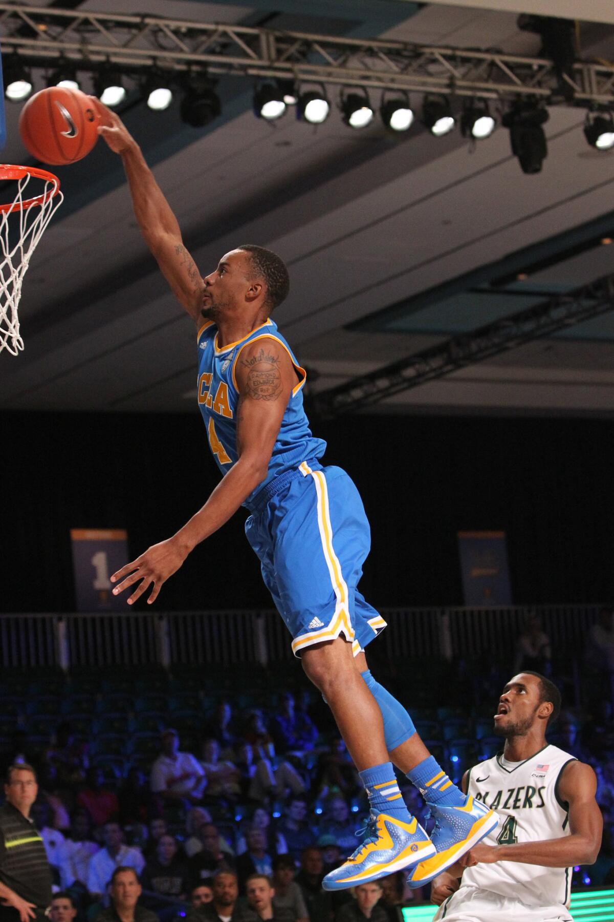 UCLA guard Normal Powell goes for a dunk against UAB during the Bruins' 88-76 win Friday over the Blazers at the Battle 4 Atlantis.