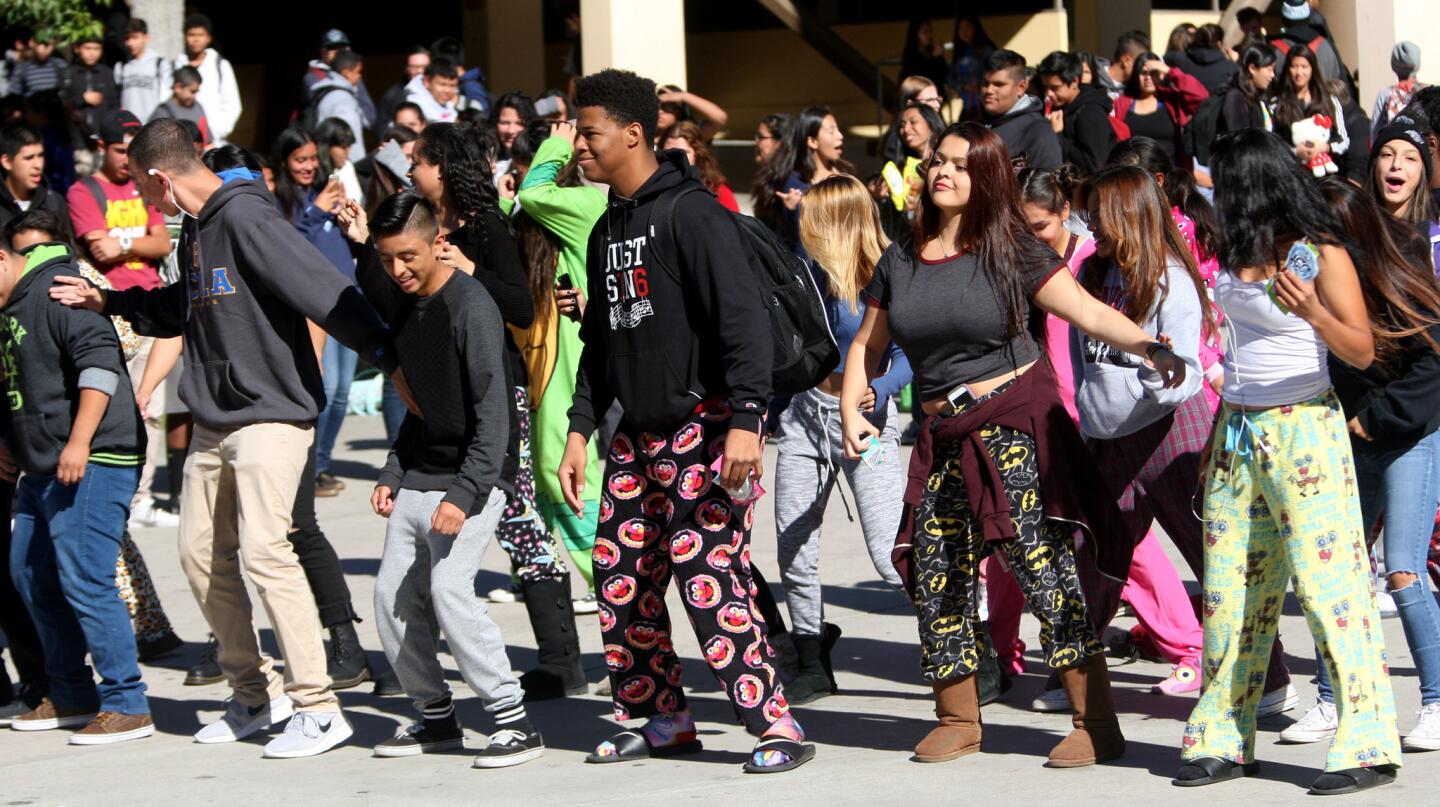 As part of Spirit Week, a group of students, some wearing pajamas, danced during lunch for Pajama Day at Glendale High School in Glendale on Thursday, November 5, 2015.
