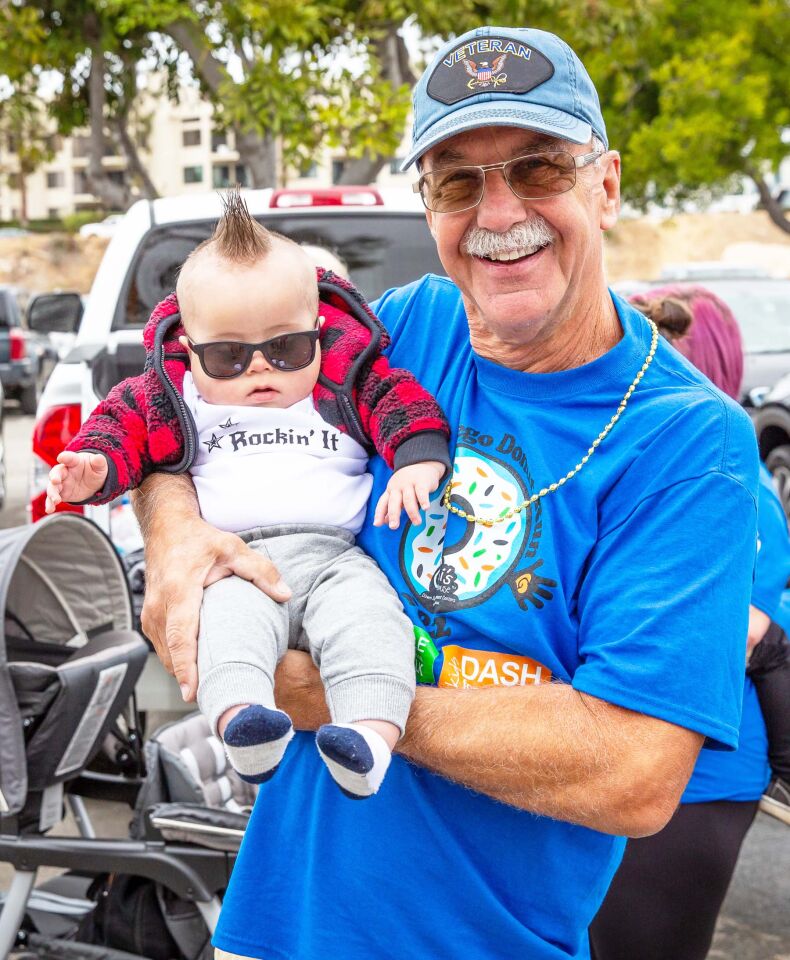 John Scalone holding his grandson, Brody.