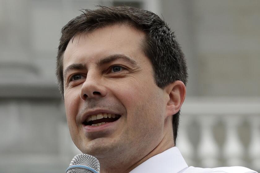 Democratic presidential candidate South Bend, Ind., Mayor Pete Buttigieg speaks outside the Statehouse, Wednesday, Oct. 30, 2019, in Concord, N.H., after filing to be placed on the New Hampshire primary ballot. (AP Photo/Elise Amendola)