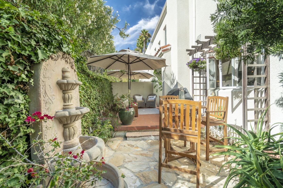 A patio and dining area sits off the main living area.